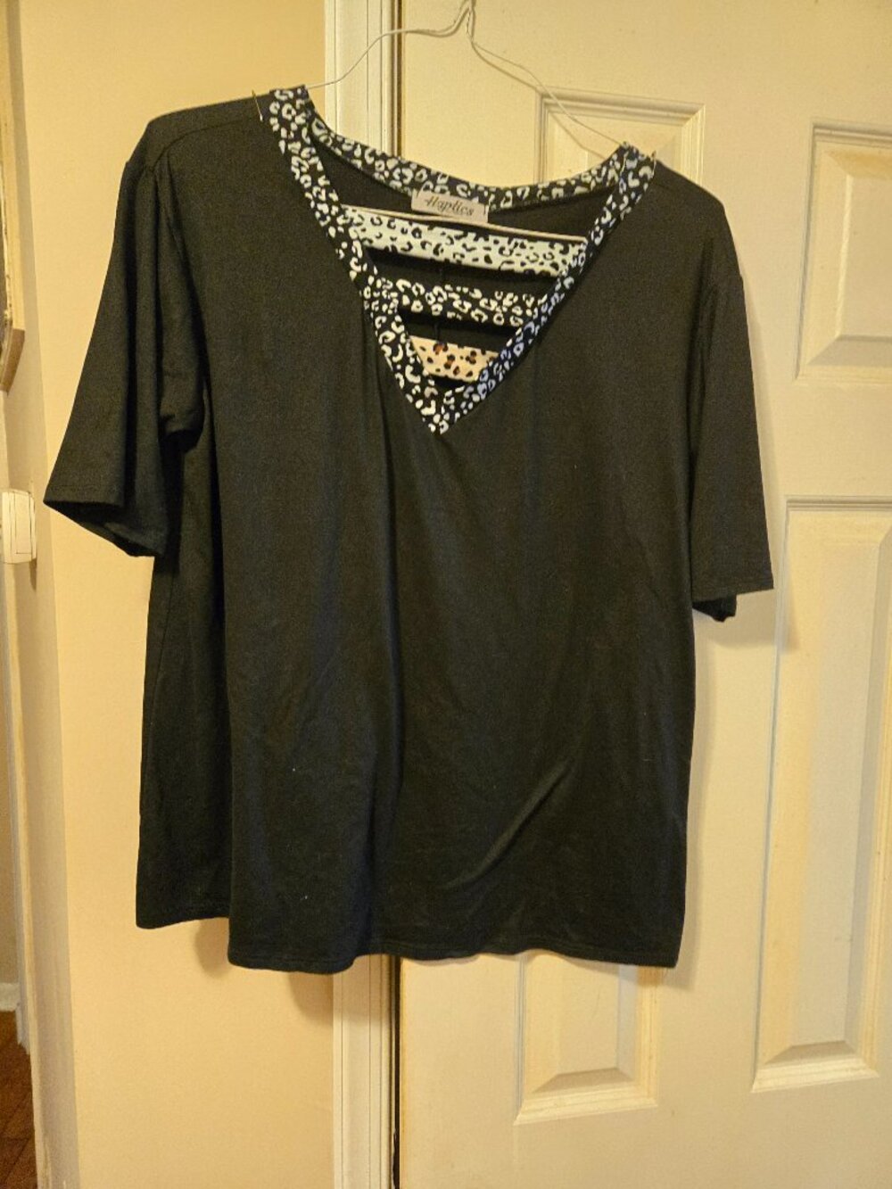 Haptics L, black tee shirt with animal print trim